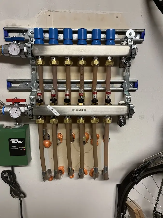 Plumber performing Gas Line Installation at a residential property in Fulton