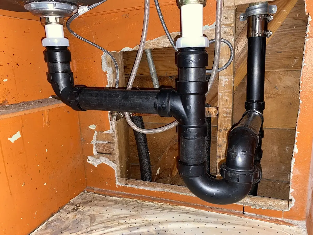 Professional Garbage Disposal Repair equipment and tools on the job in Fulton